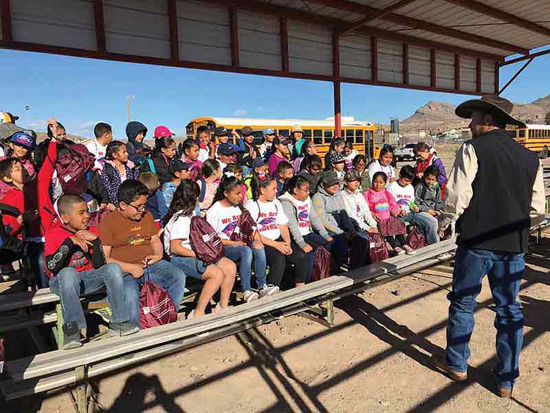 Students at outdoor presentation 